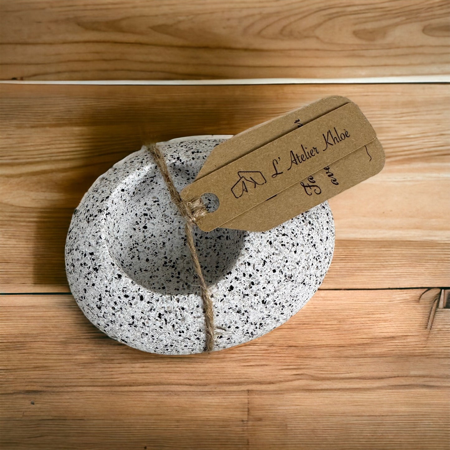 Wave-shaped candle holder, handmade with a raw granite finish