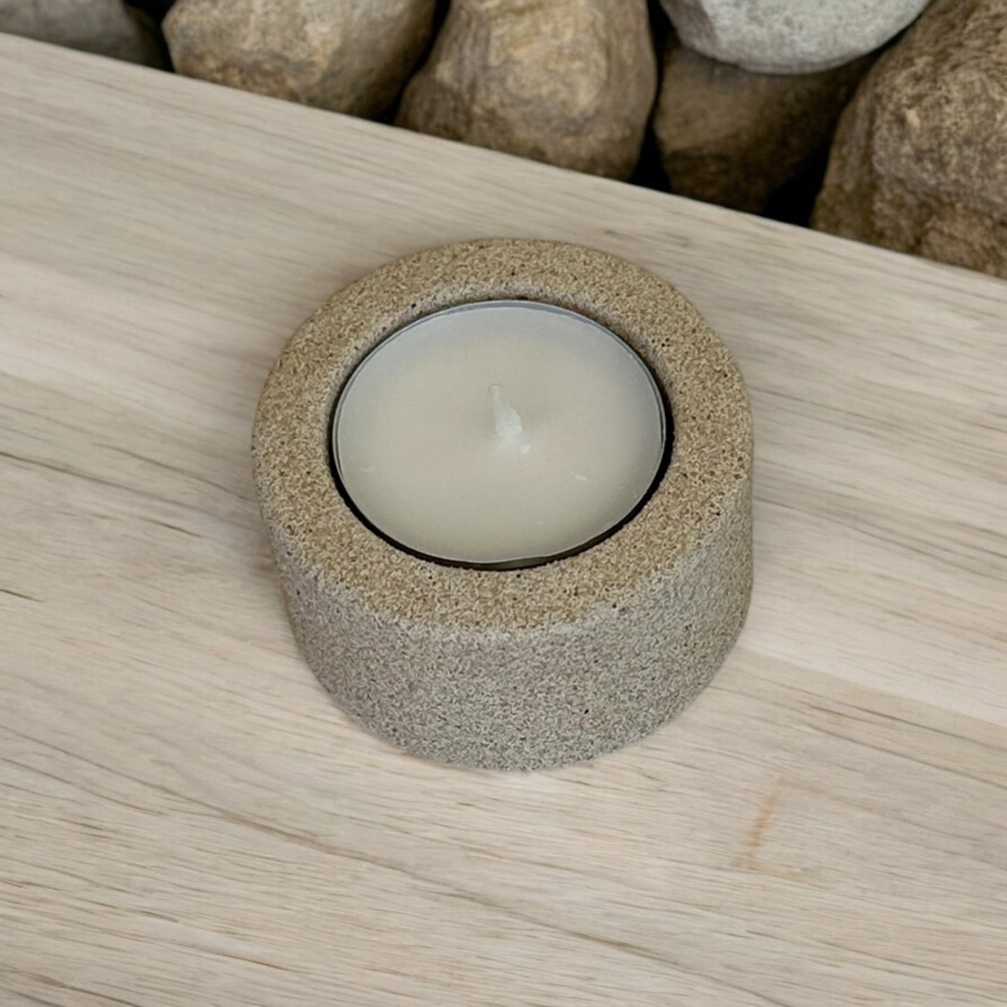 Round candle holder, one place, handmade with a raw granite finish