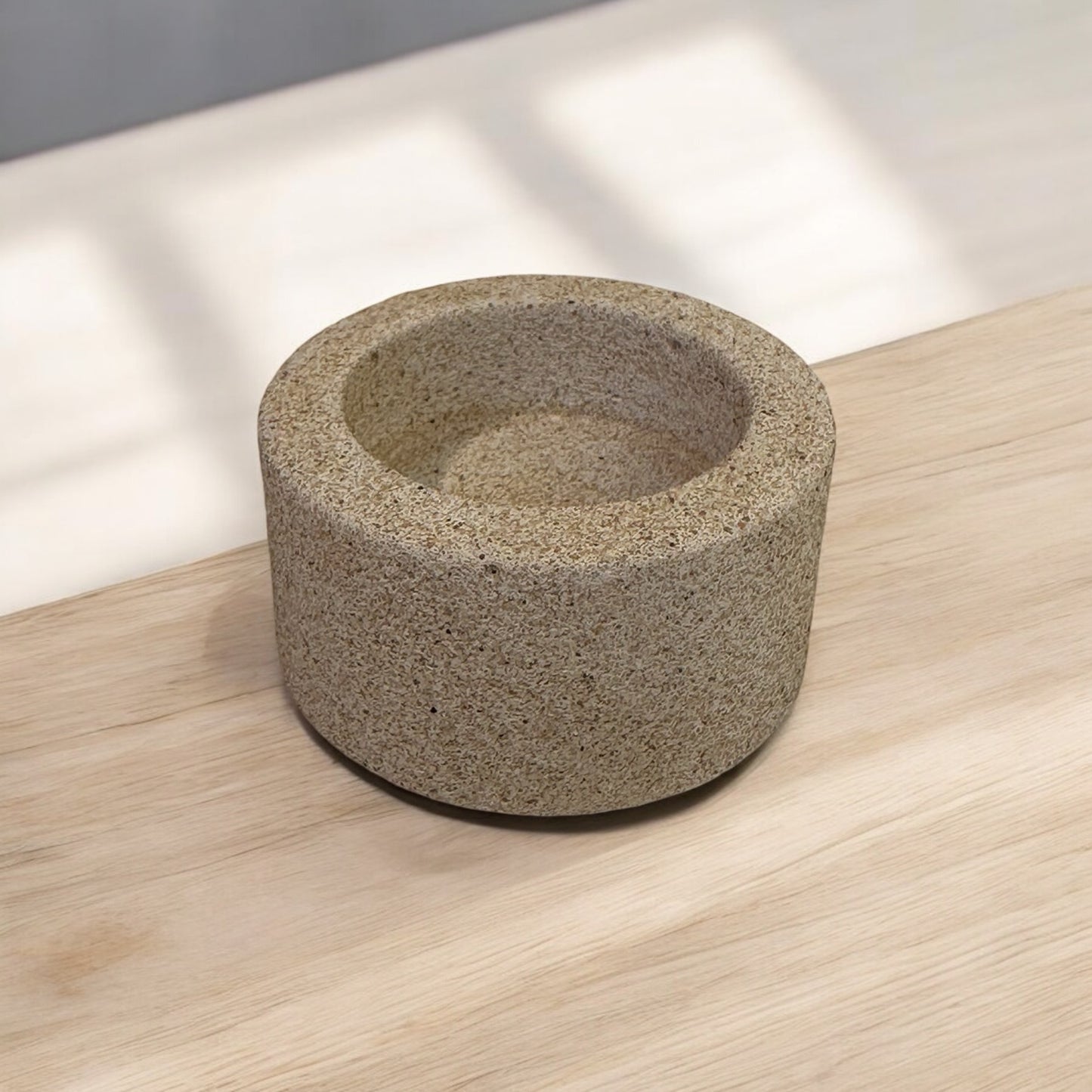 Round candle holder, one place, handmade with a raw granite finish